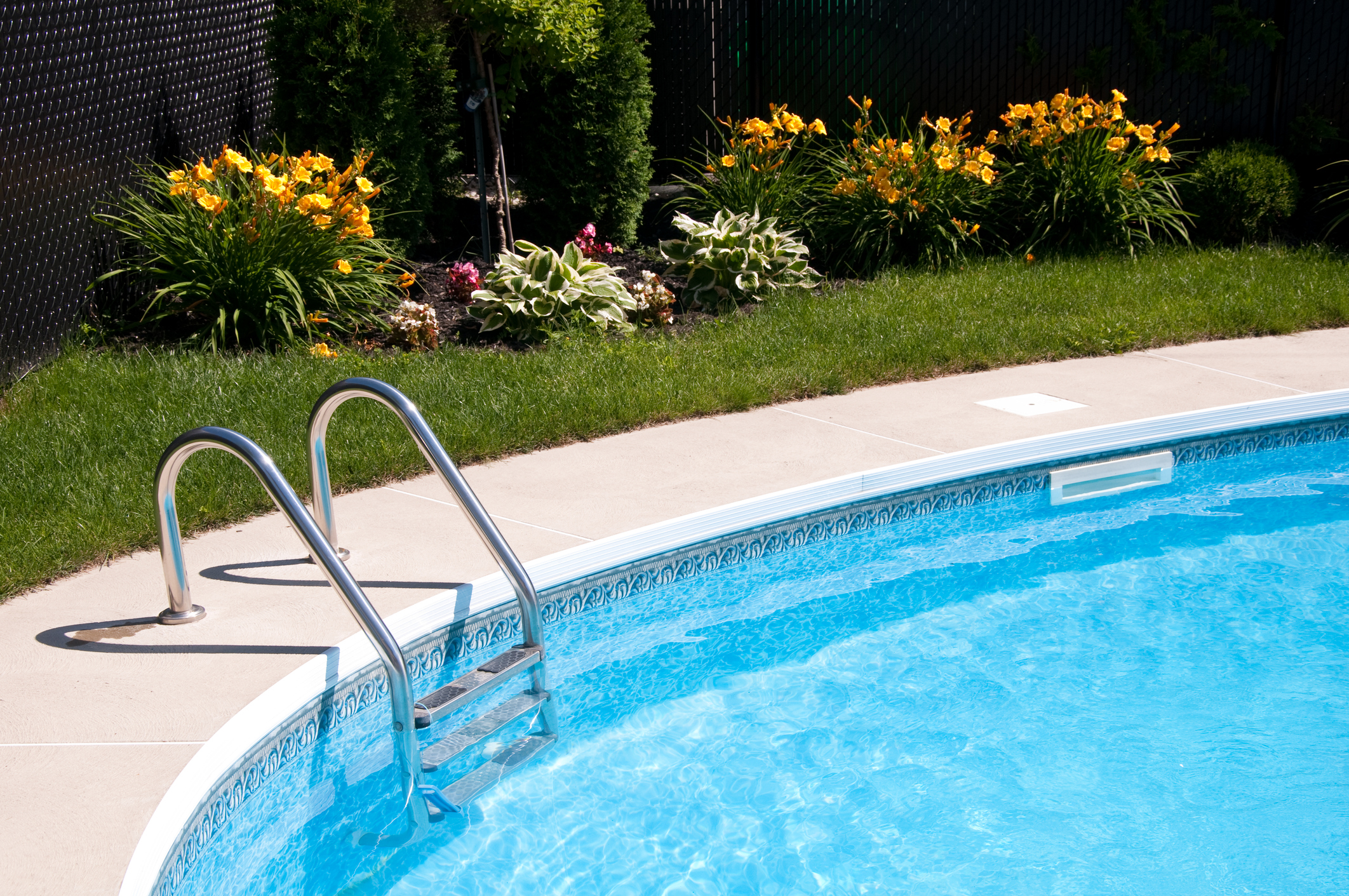 In-ground swimming pool installation.