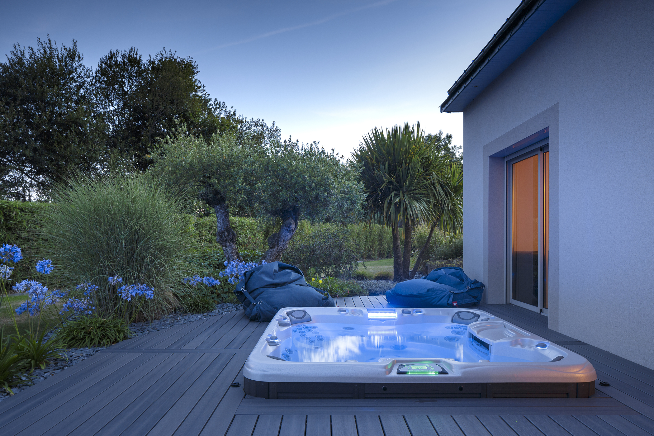 Outdoor hot tub installation at night.