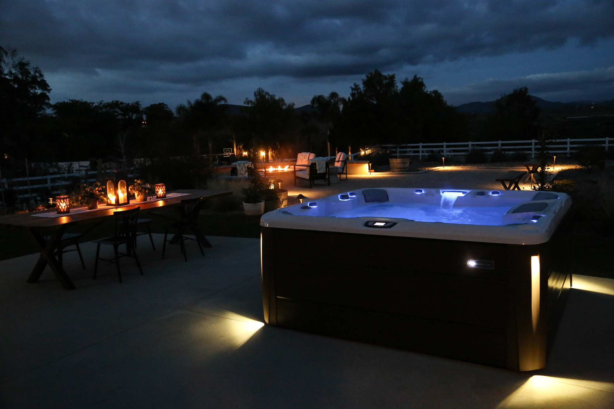 Outdoor hot tub at night.